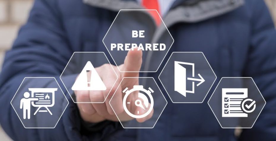 a person pointing their finger on the screen at a graphic that says be prepared. Other icons appear that relate to emergency preparedness.